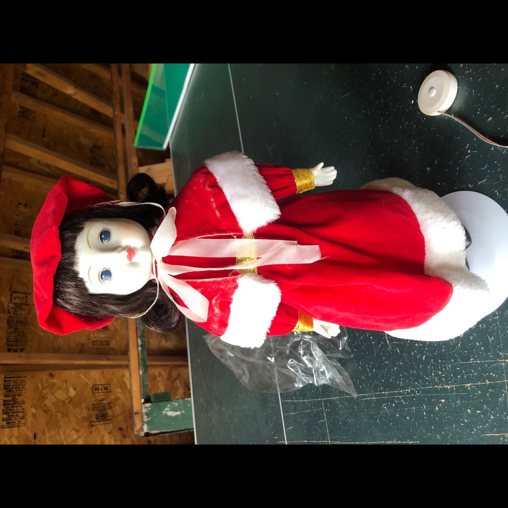 Unknown brand collectable porcelain doll.